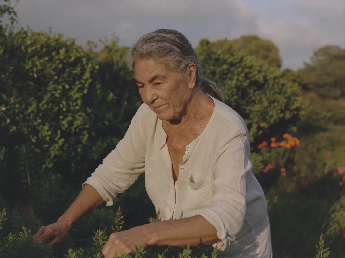 Woman in her sixties tending her garden